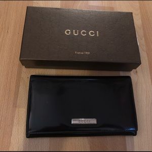 Authentic GUCCI black patent leather bifold wallet